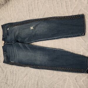 Medium wash Rachel Roy jeans size 32 with studded detail down both sides.